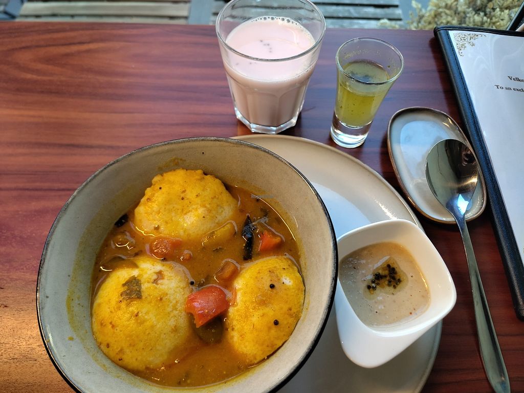 Dumplings in curry, served with chai