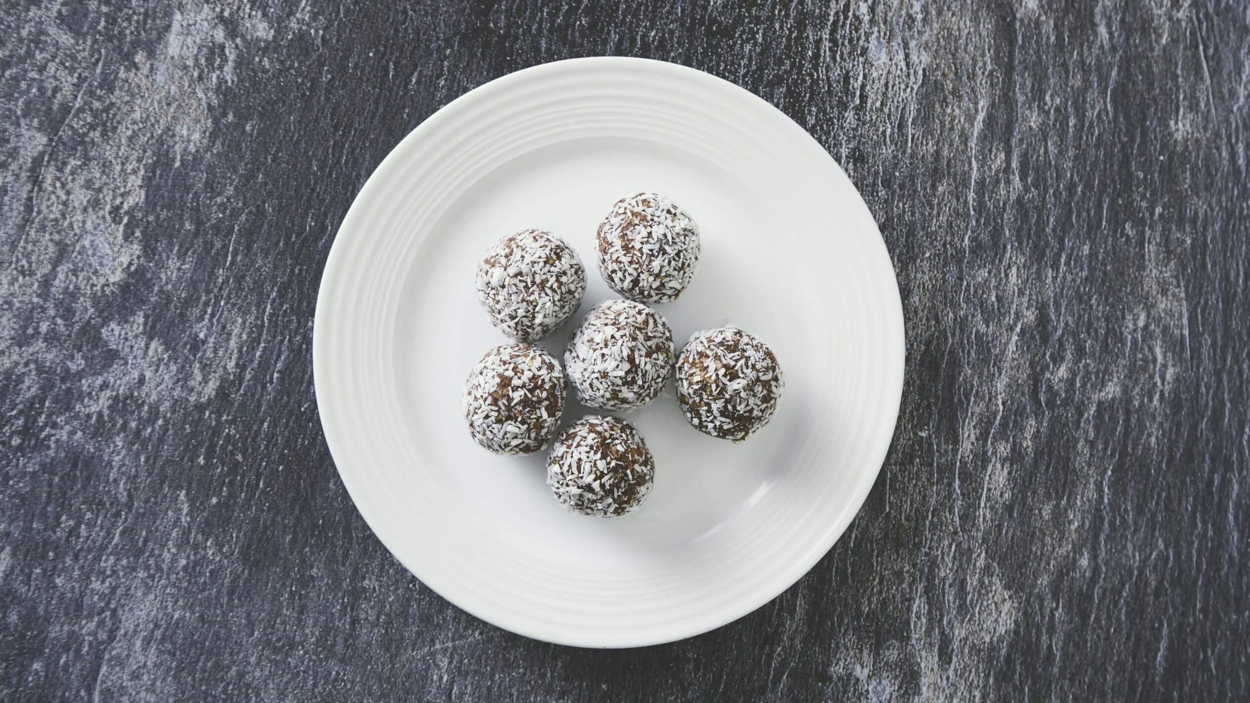 Coconut-rolled laddoo balls