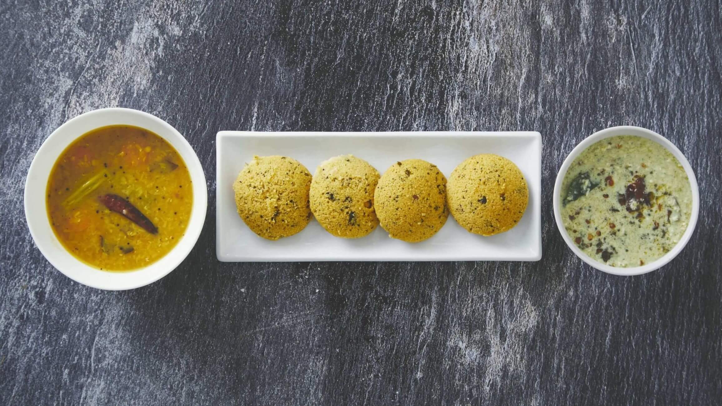 Idli and sambar with coconut chutney